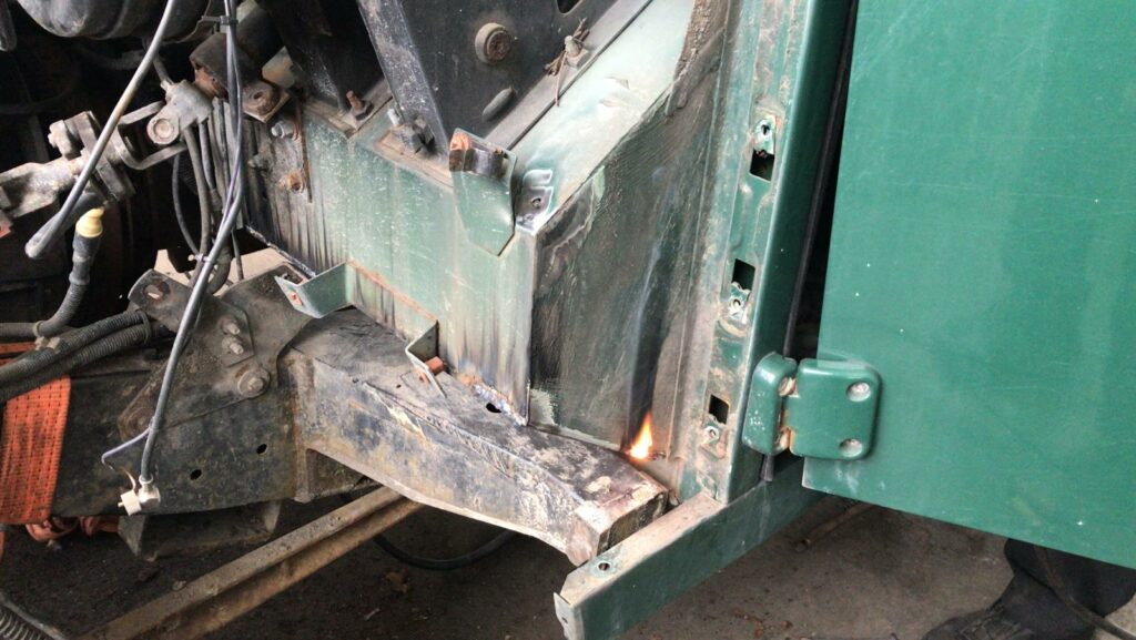 Welding the new footwell (view from the outside)