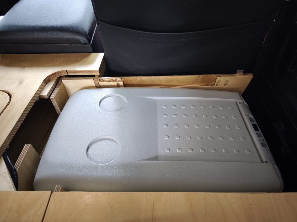 Fridge installment inside the car as seen from the top