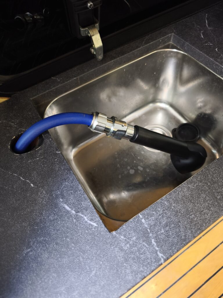 extended hand shower for outdoor showering (second picture)
