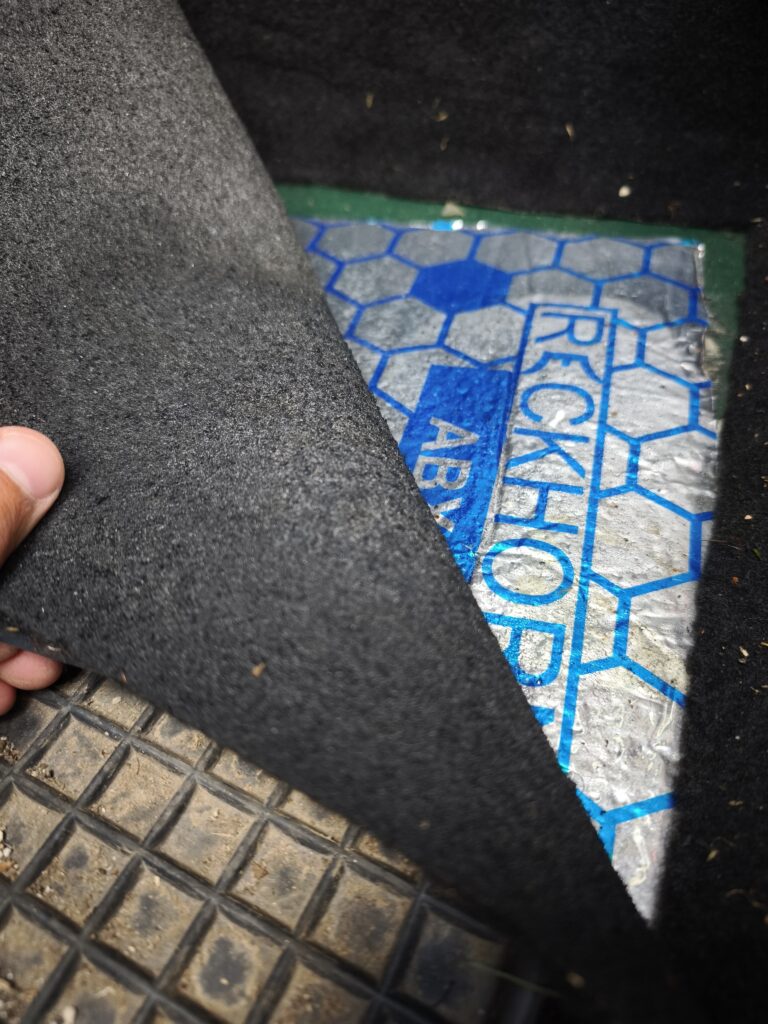 Defender footwell with Alubutyl and car floor mat